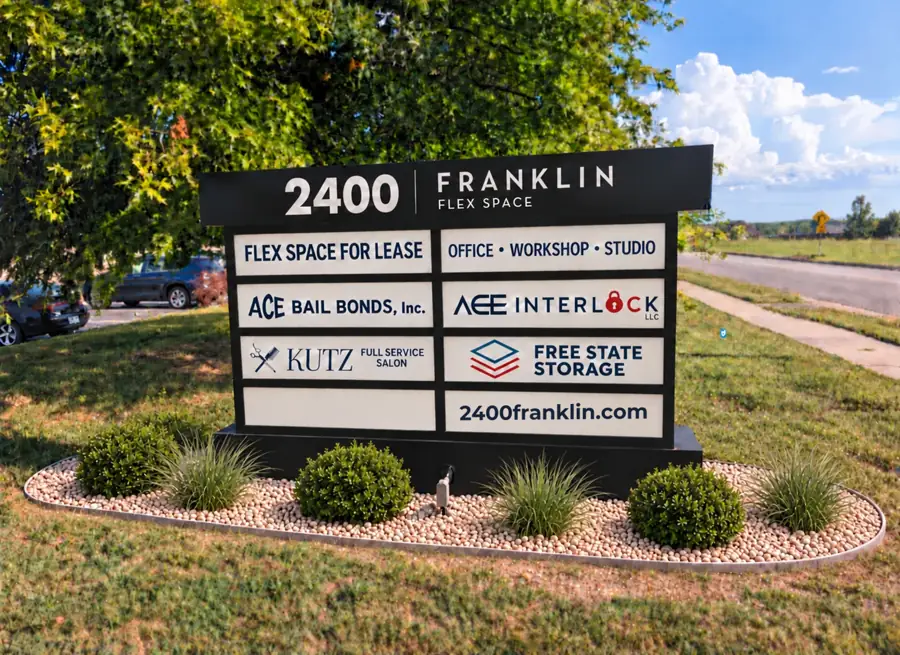 Rendering of the monument sign on Franklin Road: 2400 Franklin at the top, flex space for lease, and panels for the businesses in the building